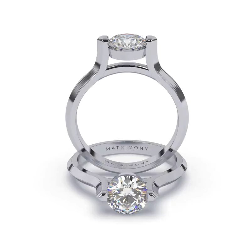 Hermoso anillo de compromiso solitario con un diamante redondo. Este modelo se encuentra disponible con piedras de zirconia ó diamante y en oro de 9k, 14k, 18k ó platino.